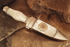 Mother of pearl handled dagger with matching scabbard