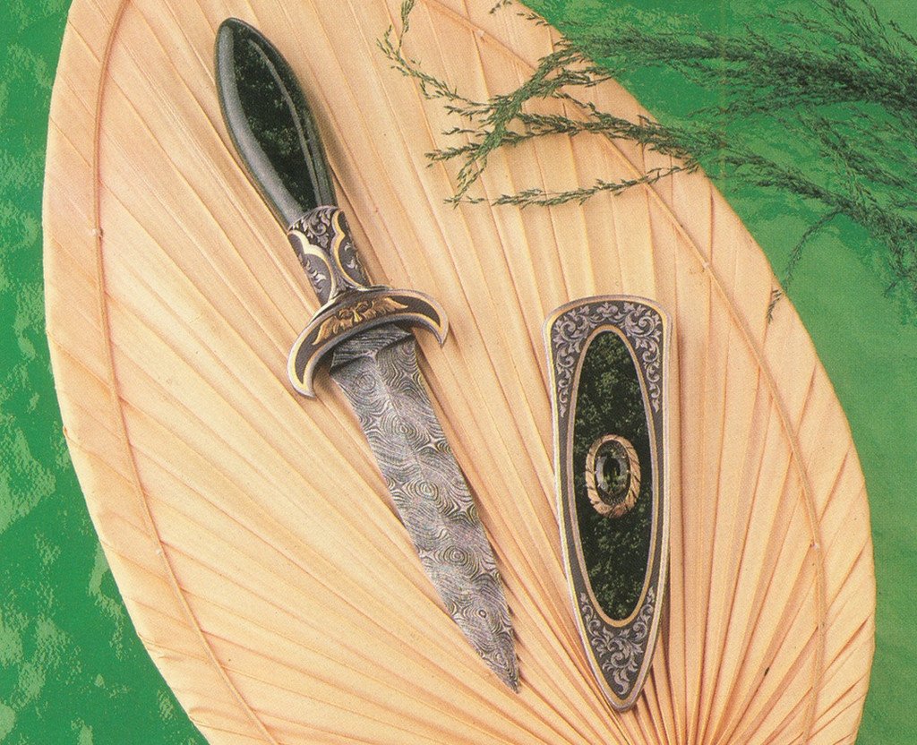 Engraved jade handled boot knife and matching scabbard