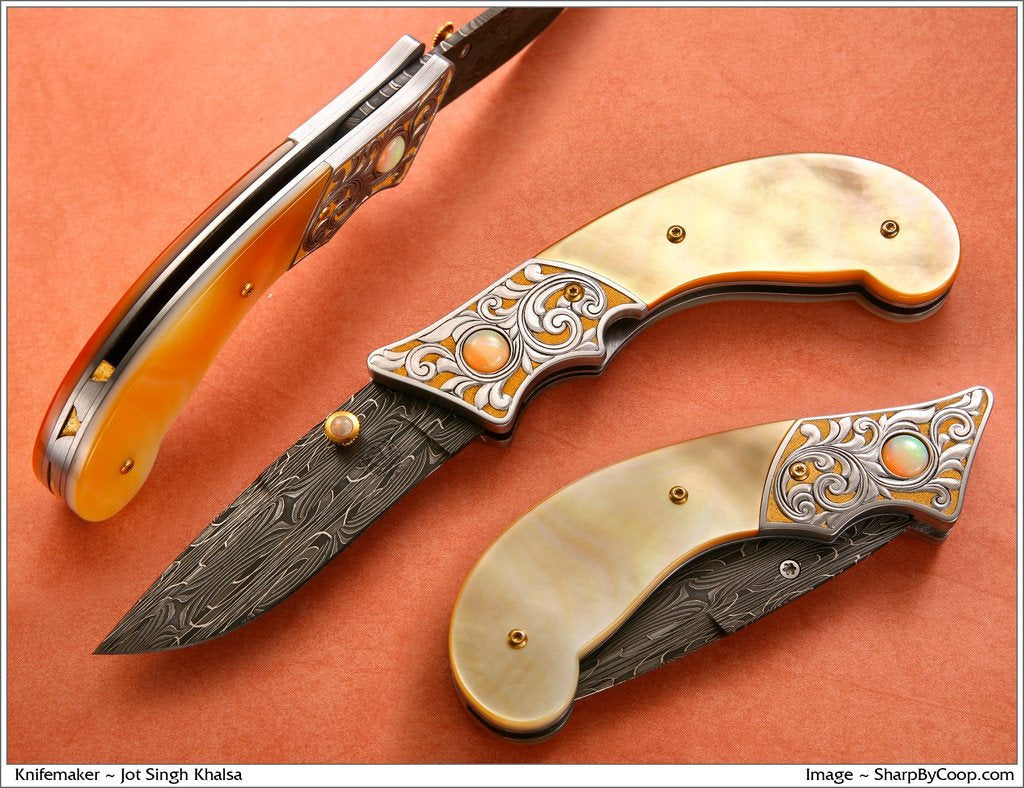 Engraved gold mother of pearl folding knife