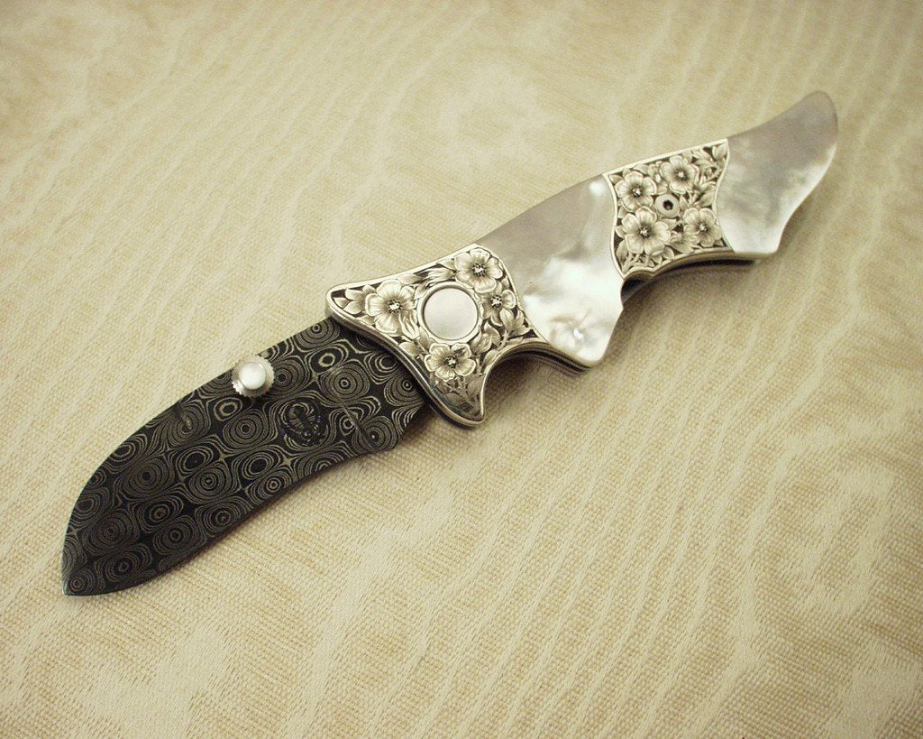 Engraved mother of pearl folding knife