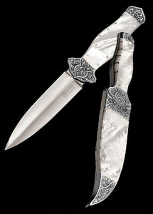 Mother of pearl handled dagger and matching sheath