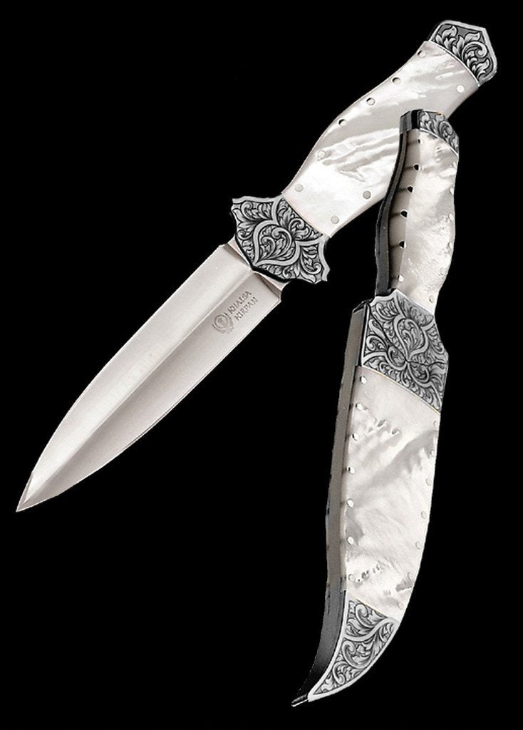 Mother of pearl handled dagger and matching sheath